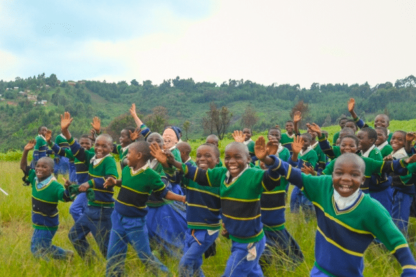 kids-running-in-field-happily